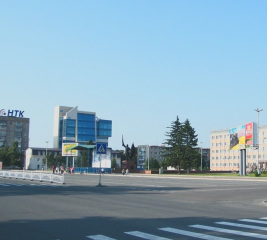 город